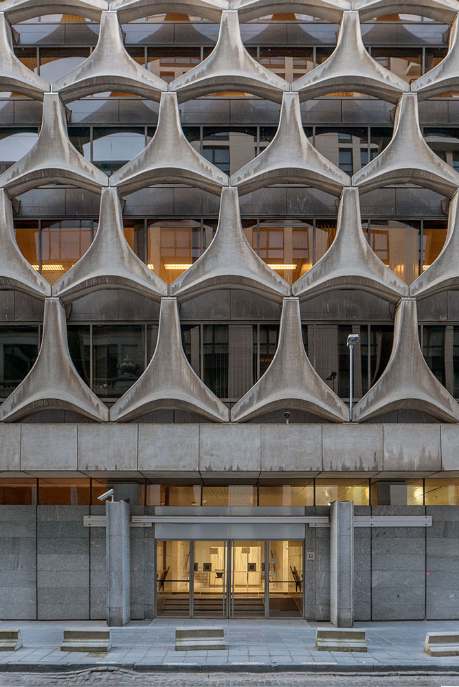Bnp paribas building, rue neuve, paris, designed by marcel breuer. Completed in 1972, this brutalist structure features raw concrete and precast panels, showcasing breuer's geometric design and functional aesthetics. © marcel bretzel