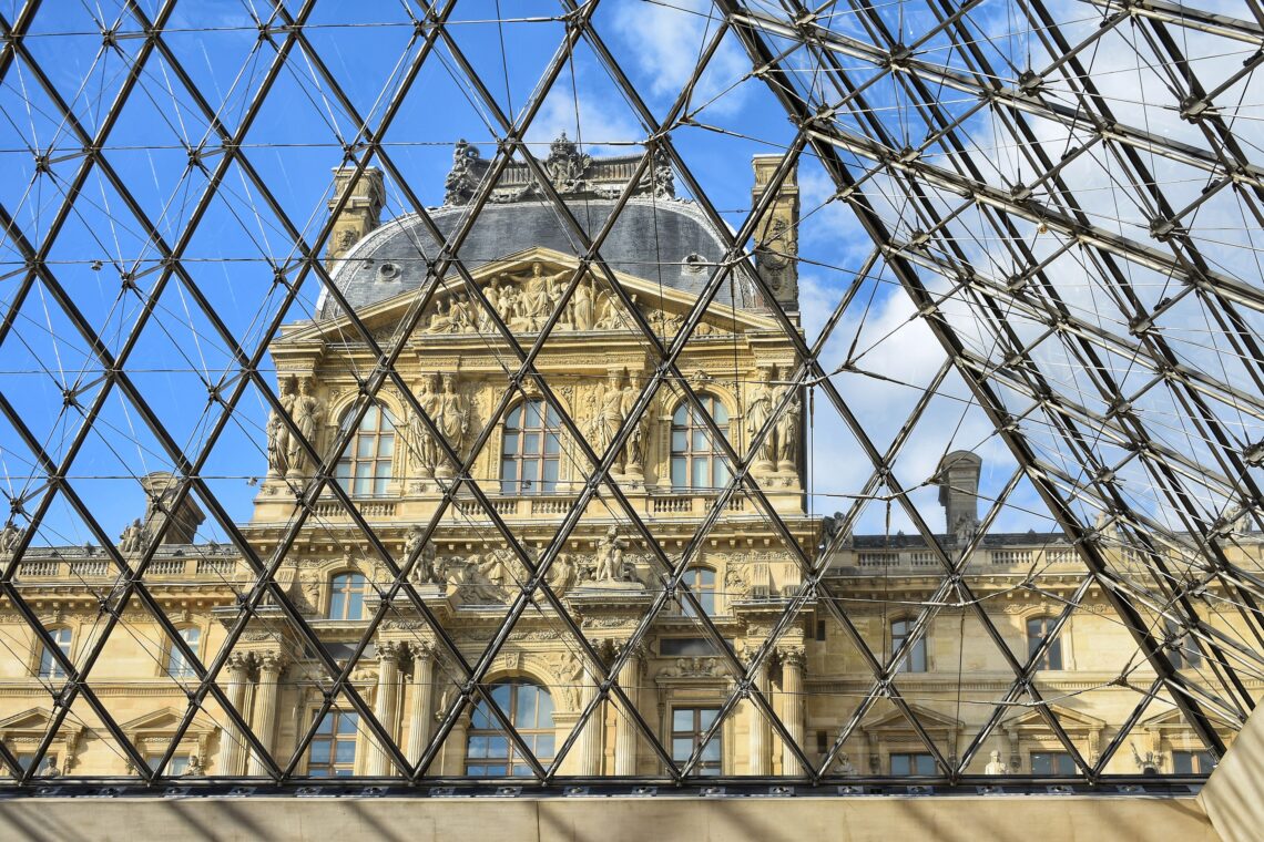 The view of the louvre museum in paris from the underground lobby of the pyramid - © babyaimeesmom
