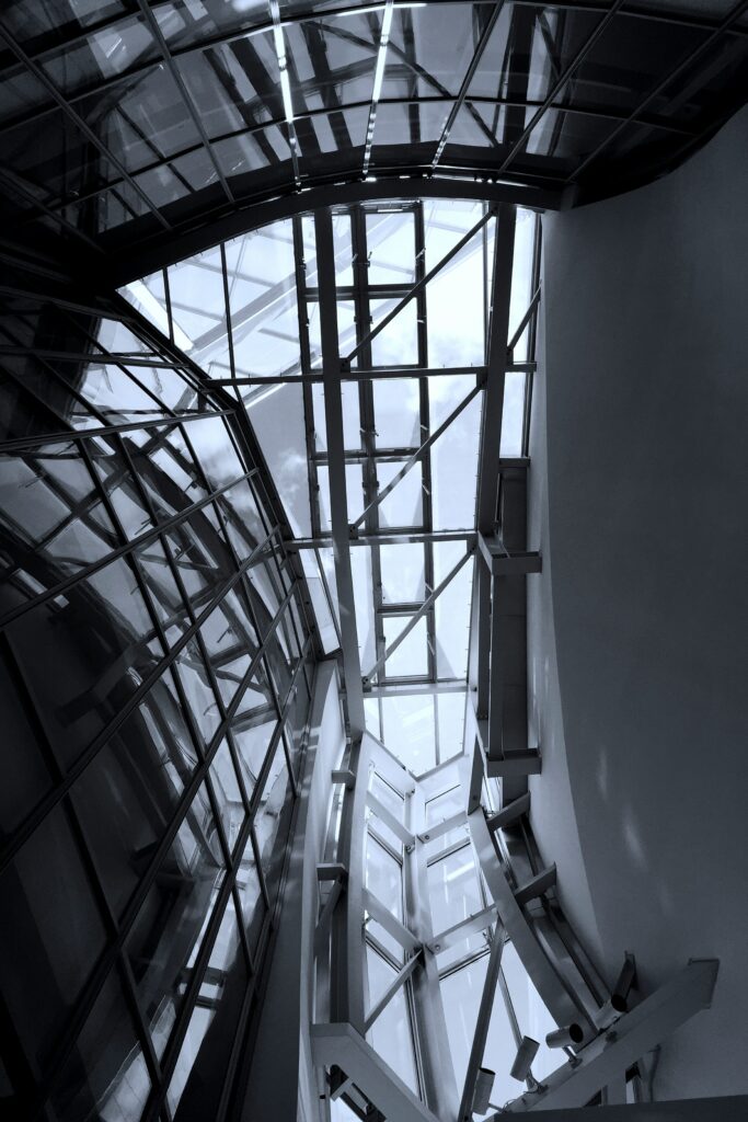 White metal framed glass ceiling - louis vuitton foundation art museum and cultural center - paris, france - © serge le strat