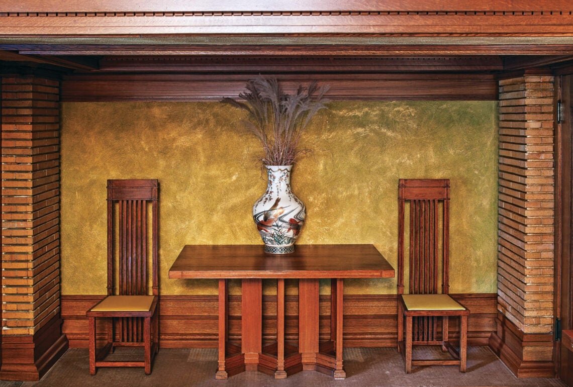 Original Wright-designed furniture is displayed along the west wall of the reception room © Biff Henrich