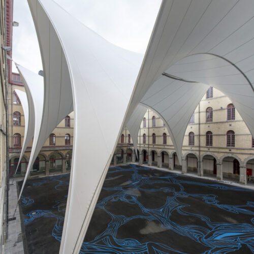 Covering of the courtyard of the carré des arts in mons / agwa + ney & partners