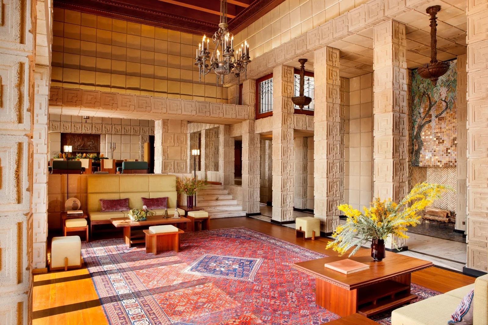 Living room of ennis house, showcasing wright's intricate design elements. © architectural digest