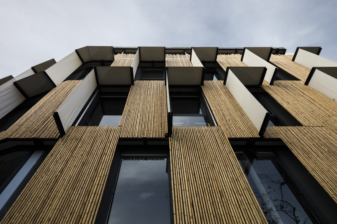 11 bioclimatic flexi office t3 architects bamboo facade