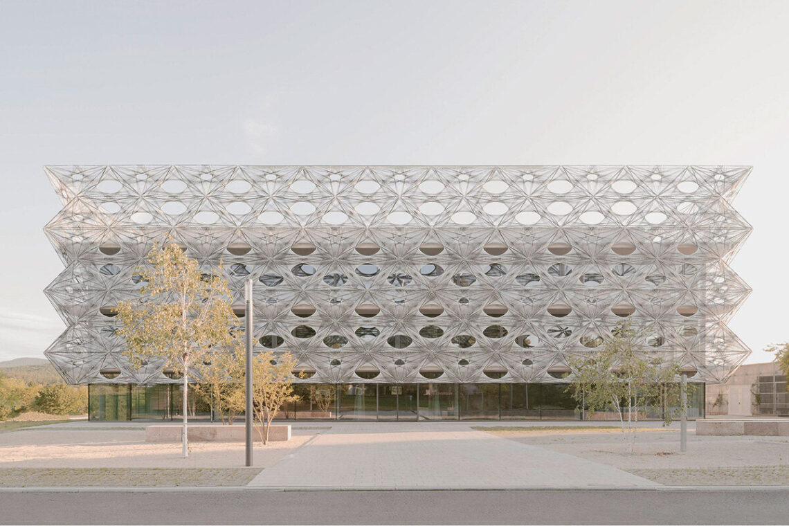 Wrapped in a robotically woven facade, texoversum university building opens in germany